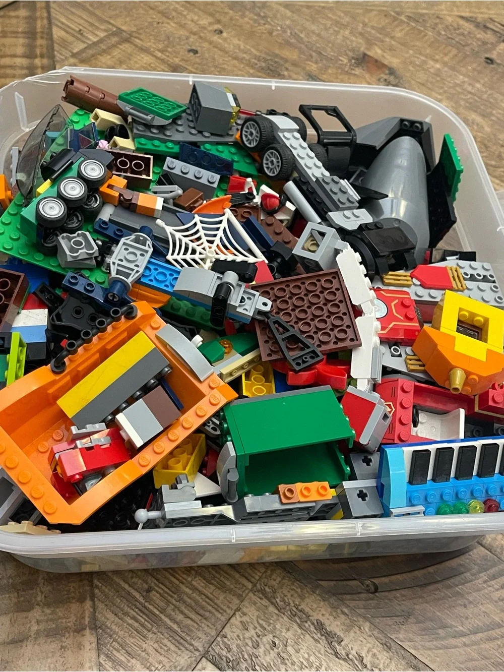 mixed assortment of LEGO brand bricks, plates, and specialty components